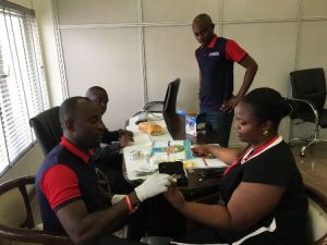 Pathcare Laboratories staff screening a Punch staff