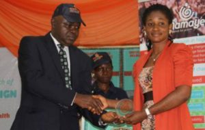 National Mirror Correspondent, Franka Osakwe, receiving her award.